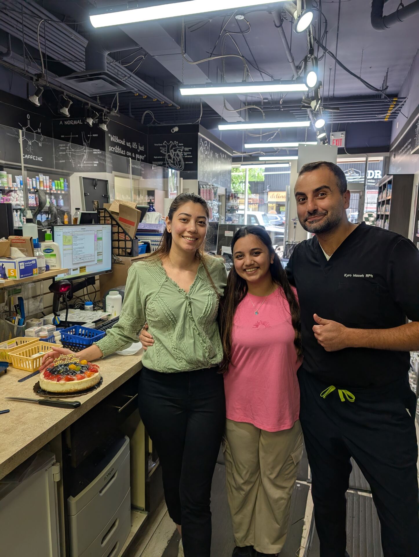 The Lawlor Pharmasave team celebrating together in-store